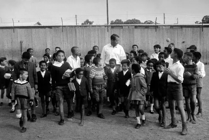 Framed Print : Basil D Oliveira Cricket Player in South Africa with a group of children Framed Print : Basil D Oliveira Cricket Player in South Africa with a group of children