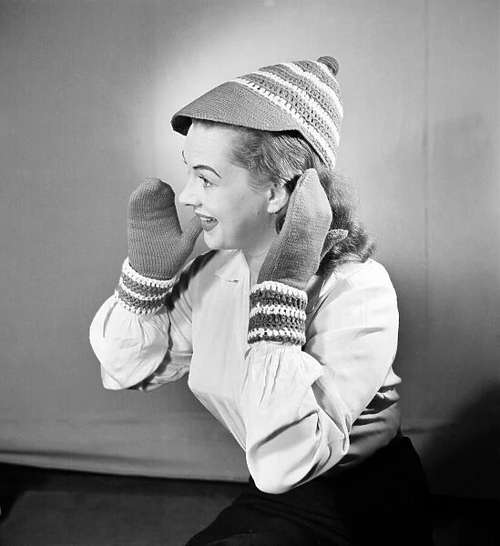 Basketball cap and mitts. February 1952 C6278-003
