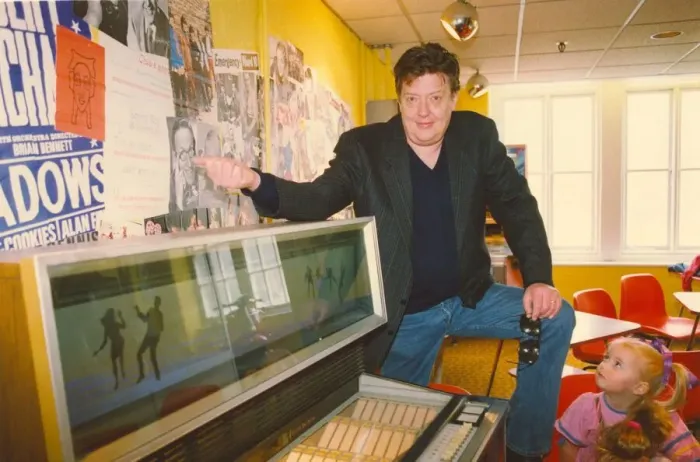 Framed Print : Former bassist of The Animals pop group Chas Chandler (left) Framed Print : Former bassist of The Animals pop group Chas Chandler (left)