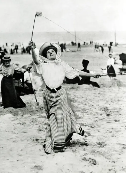 Framed Print : Bathers on holiday playing Diavolo on the beach Edwardian Beach clothing - long Framed Print : Bathers on holiday playing Diavolo on the beach Edwardian Beach clothing - long