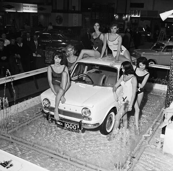 Bathing beauties with the new Simca 1000 in display fountains at the Earls Court Motor