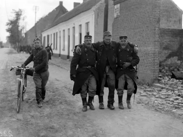 Framed Print : The Battle of Audegen Septemnber 1914 Two Belgian soldiers assist a wounded Framed Print : The Battle of Audegen Septemnber 1914 Two Belgian soldiers assist a wounded