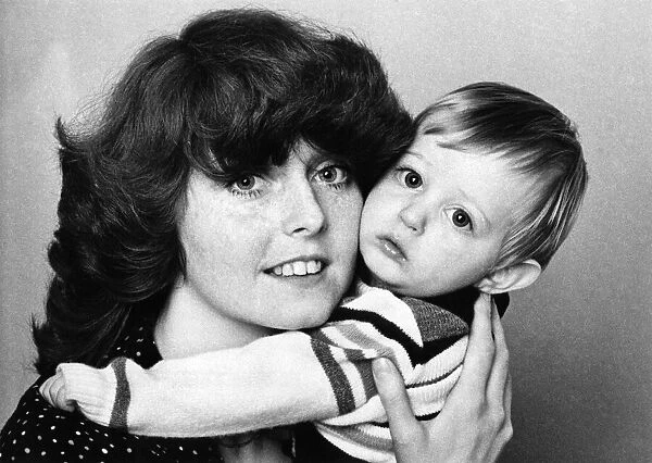 Battling Mum Kim Turley with her year-old son Daniel. November 1979 P006584