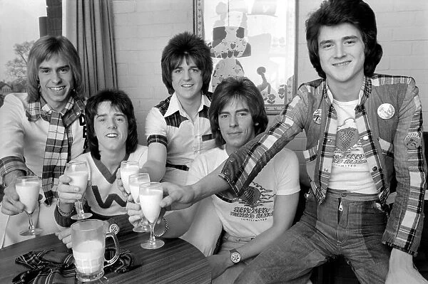 Bay City Rollers (Non-Drinkers) toast their success with milk. L. to R