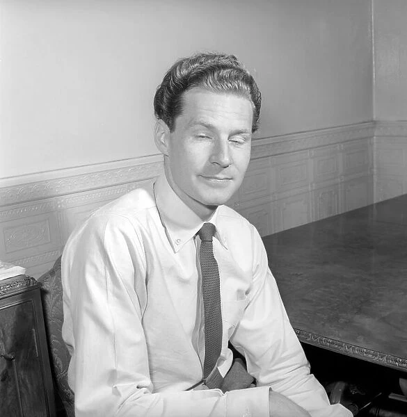 BBC Announcer Alexander McIntosh seen here at home. Circa 1957