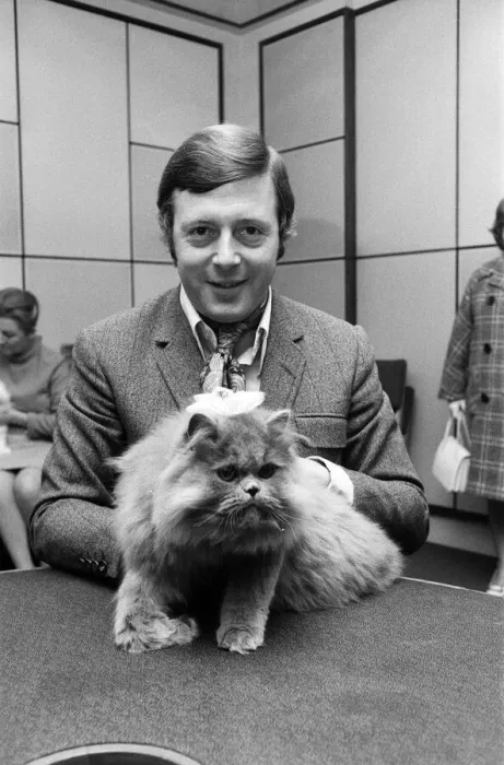 Framed Print : BBC commentator Michael Aspel at the BBC Studios at Lancaster Gate with a cat who is a Framed Print : BBC commentator Michael Aspel at the BBC Studios at Lancaster Gate with a cat who is a