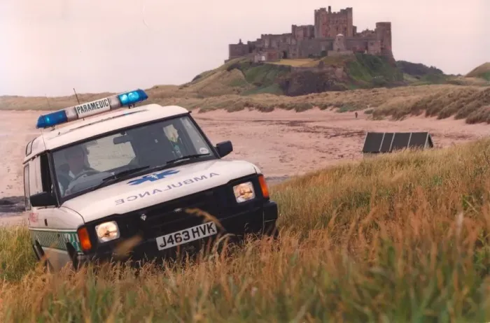 Framed Print : Beach combing - one of the new 4 wheel drive ambulances in action at Bamburgh Castle Framed Print : Beach combing - one of the new 4 wheel drive ambulances in action at Bamburgh Castle