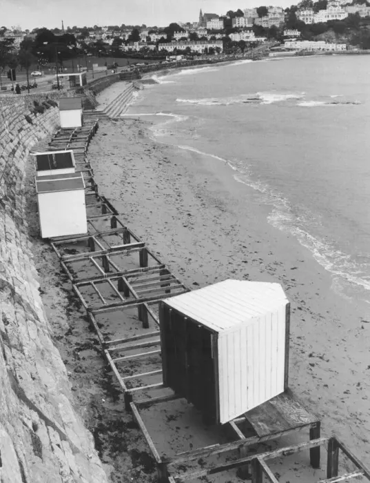 Framed Print : Beach hut tossed aside by the waves in September 1991. Devon