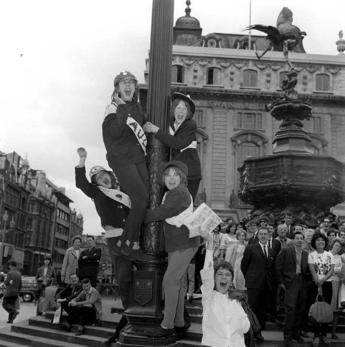 Framed Print : The Beatles 6 July 1964 Four fans up lamp post who are waiting to see The Beatles before