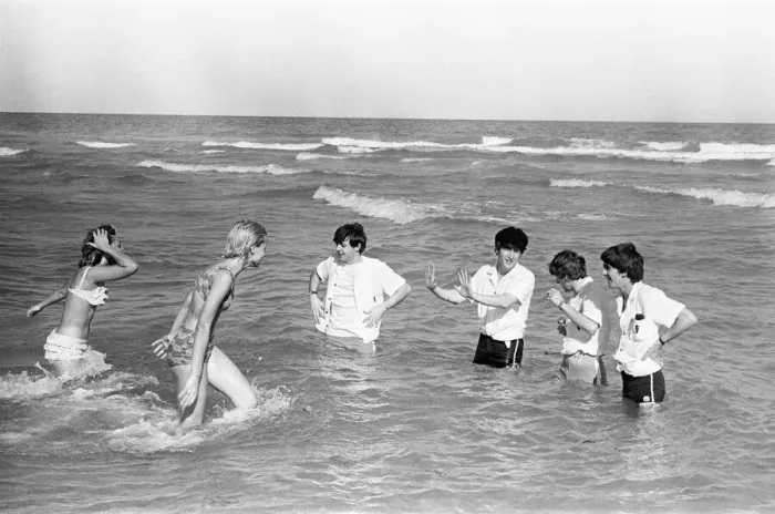 Framed Print : The Beatles in America, 18th February 1964. Having some fun on beach in Miami Framed Print : The Beatles in America, 18th February 1964. Having some fun on beach in Miami