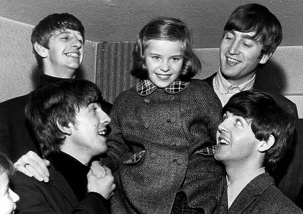 The Beatles with Anne Escreet aged 9 who was specially invited to meet them at their