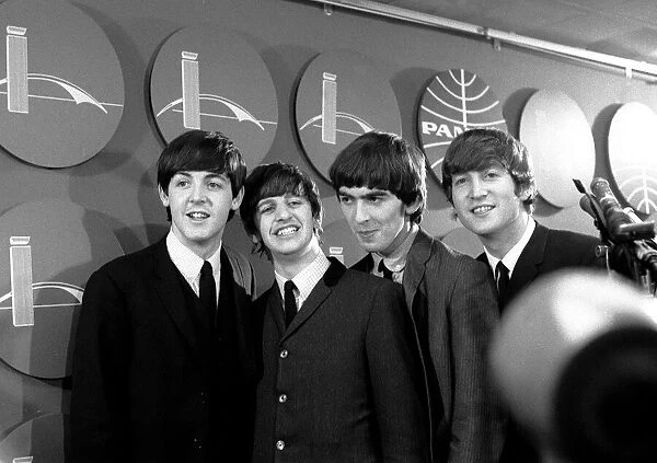 The Beatles answer questions for newsmen and journalists in New York after their arrival