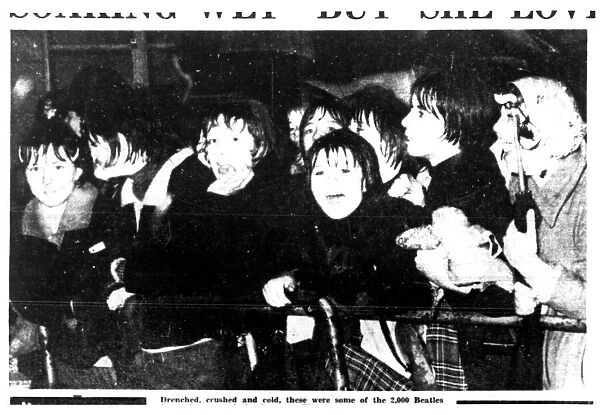 The Beatles appearing on stage at Coventry Theatre. Drenched, crushed and cold