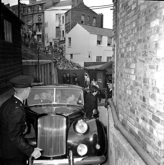 Framed Print : The Beatles arriving backstage at the Futurist theatre in Scarborough 9 August 1964