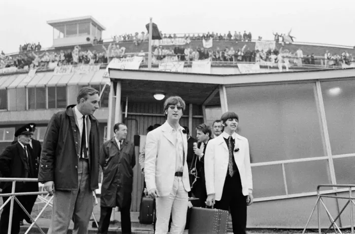 Framed Print : The Beatles arriving at London Heathrow Airport after their last ever concert tour of