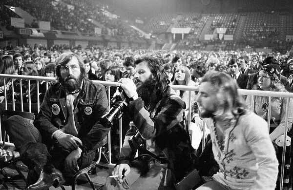 Former Beatles drummer Ringo Starr with his camera at a T-Rex concert at Empire Pool in