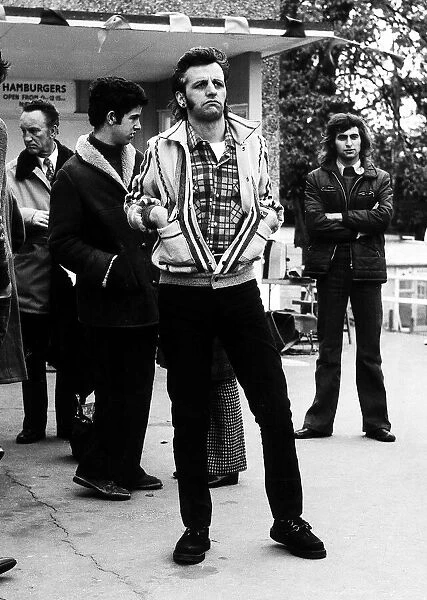 Former Beatles drummer Ringo Starr dressed in the late 50