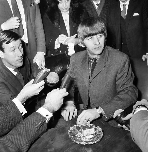 Beatles drummer Ringo Starr speaks to the press before entering the University College