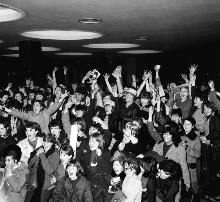 Framed Print : Beatles Fans at Heathrow airport await the return of the group from their tour of the USA