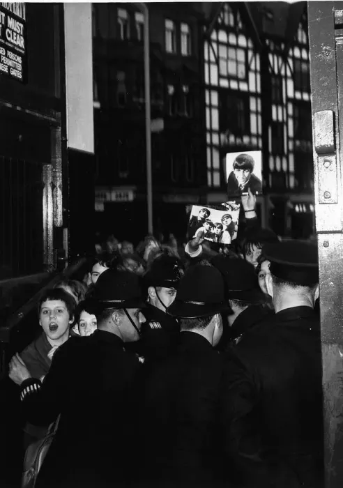 Framed Print : Beatles fans outside the London Palladium being held back from the band 13 October 1963