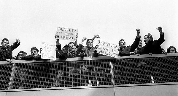 The Beatles February 1964 Protestors and enthusiastic banners greet the Beatles
