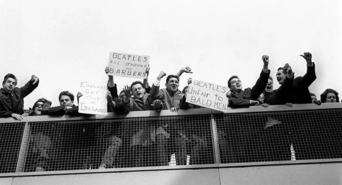 Framed Print : The Beatles February 1964 Protestors and enthusiastic banners greet the Beatles Framed Print : The Beatles February 1964 Protestors and enthusiastic banners greet the Beatles