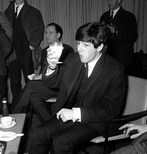 The Beatles leaving for New York. Paul McCartney before boarding the aircraft 7 February