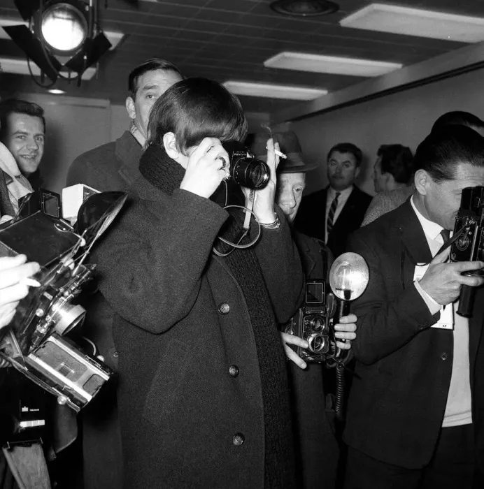 Framed Print : The Beatles Leaving for New York. Ringo Starr taking pictures of Paul McCartney along Framed Print : The Beatles Leaving for New York. Ringo Starr taking pictures of Paul McCartney along