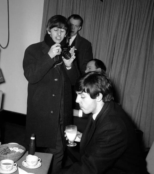 Framed Print : The Beatles Leaving for New York, Ringo Starr taking pictures of Paul McCartney