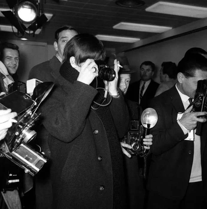 Framed Print : The Beatles Leaving for New York. Ringo Starr taking pictures of Paul McCartney along Framed Print : The Beatles Leaving for New York. Ringo Starr taking pictures of Paul McCartney along