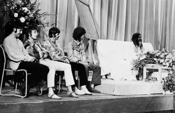 Framed Print : The Beatles with the Maharishi Yogi who is clutching bundles of flowers Framed Print : The Beatles with the Maharishi Yogi who is clutching bundles of flowers
