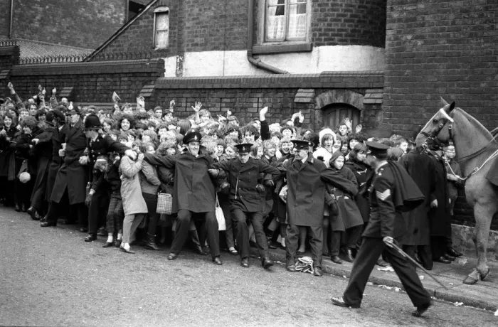 Framed Print : The Beatles November 1963 Policemen and women help to push the teenagers back