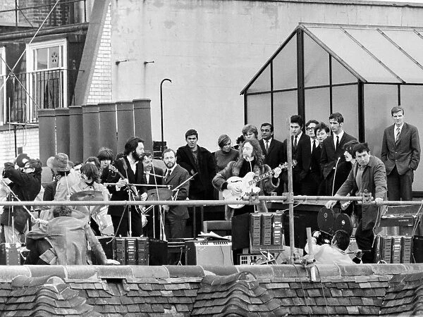 The Beatles perform a rooftop concert at Apple Headquarters