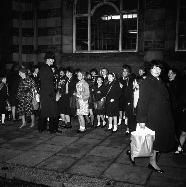 The Beatles play Wolverhampton. Fans queuing outside The Gaumont Cinema