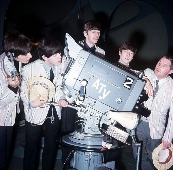 The Beatles pop group rehearse for ATV programme with comedian Ernie Wise (right)