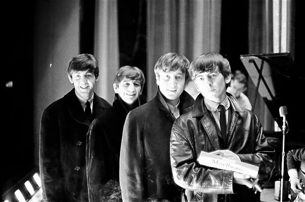 The Beatles pose for the cameras at the Odeon Cinema in Cheltenham. 1st November 1963