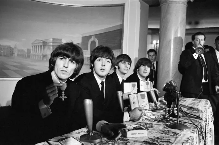 Framed Print : The Beatles pose with their MBEs at a press conference held at the Saville Theatre Framed Print : The Beatles pose with their MBEs at a press conference held at the Saville Theatre