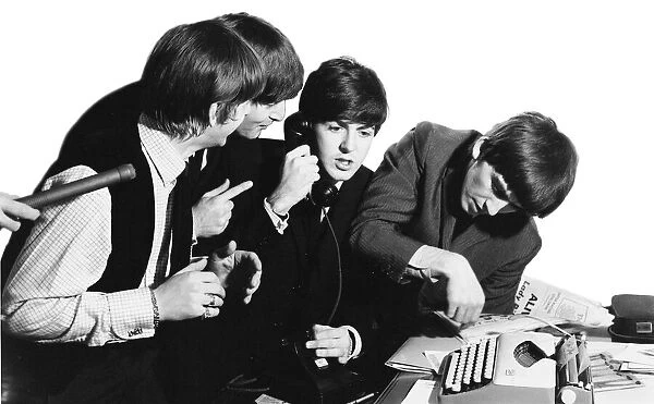 The Beatles prepare for a New York press conference during the tour of the USA