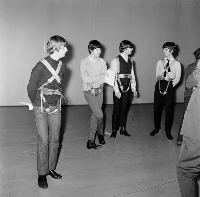 Framed Print : The Beatles running through a Flying Ballet routine with during rehearsals for Framed Print : The Beatles running through a Flying Ballet routine with during rehearsals for