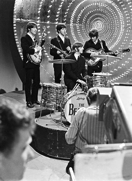 The Beatles on the set of Top Of the Pops, plugging their new single