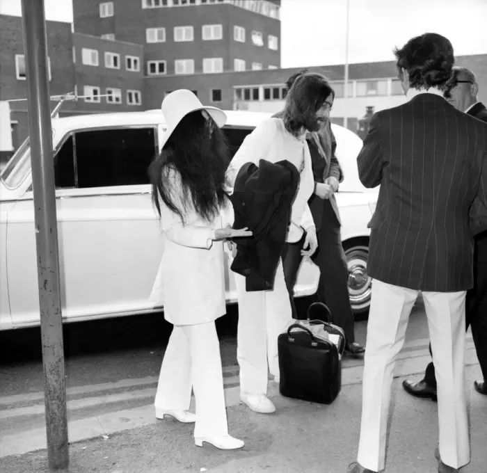 Framed Print : Beatles singer songwriter John Lennon and wife Yoko Ono pictured at Heathrow today Framed Print : Beatles singer songwriter John Lennon and wife Yoko Ono pictured at Heathrow today