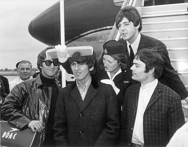 The Beatles - with stand in drummer Jimmie Nicol - return to London Heathrow Airport
