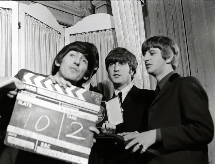 Framed Print : The Beatles with Variety Club Award March1964 Fooling around with a clapperboard Framed Print : The Beatles with Variety Club Award March1964 Fooling around with a clapperboard