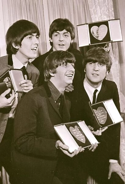 The Beatles with their Variety Club Awards March 1964 L-R George Harrison Paul