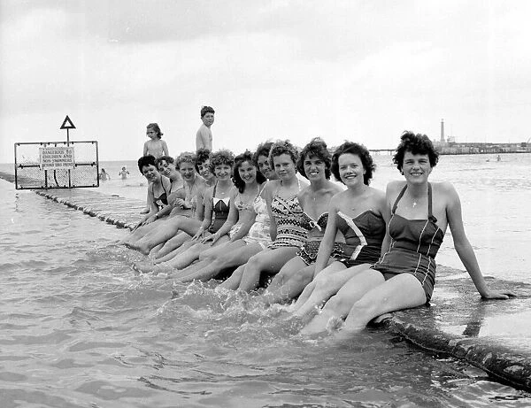 Beauty contest girls playing on the beach at Margate. 31st August1960