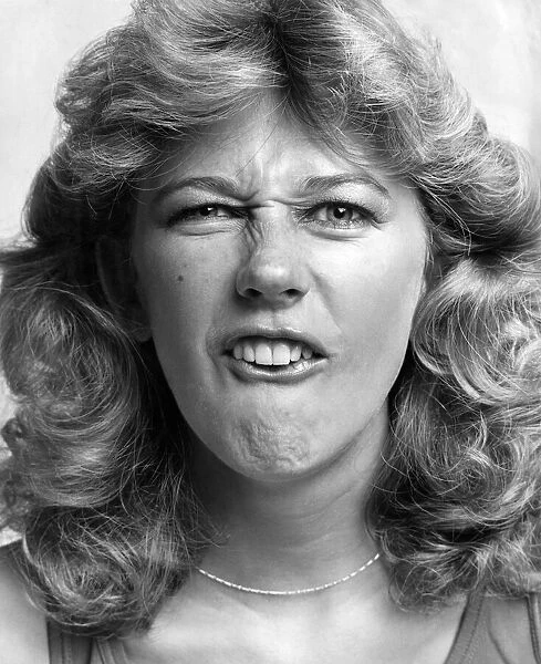 Beauty without surgery - facial exercises. Model Sara Jailkden. July 1980 P009175