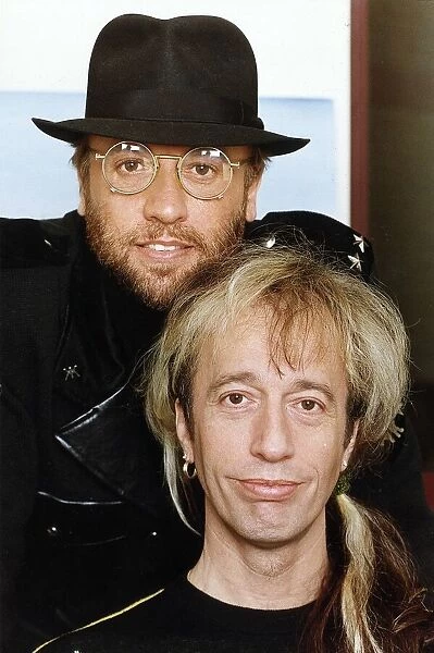Bee Gees Maurice Gibb top and Robin Gibb bottom