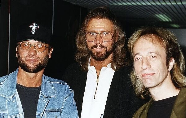 Bee Gees pop group with three brothers arrive at Heathrow from New York