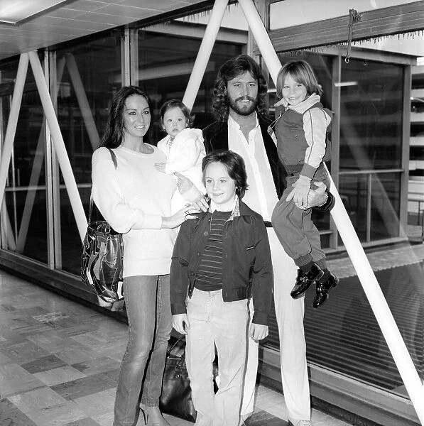 Bee Gees Singer Barry Gibb with his wife Linda and children Travis (12 months)