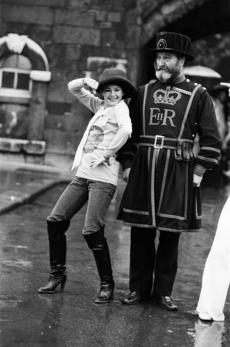 Framed Print : Beefeater Rory Crozier looks on with disbelief as disco dancer Lucia Catti (18 Framed Print : Beefeater Rory Crozier looks on with disbelief as disco dancer Lucia Catti (18